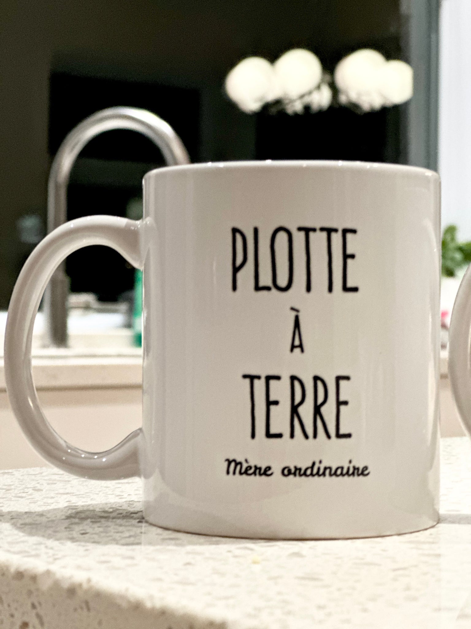 Plotte à terre tasse blanche